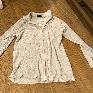 Pretty little thing size 4 blouse brand new beige color never worn